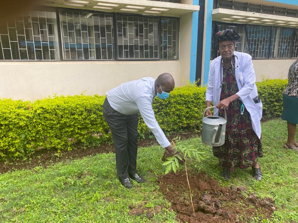 Prof Ruth Nduati participating in the tree planting exercise