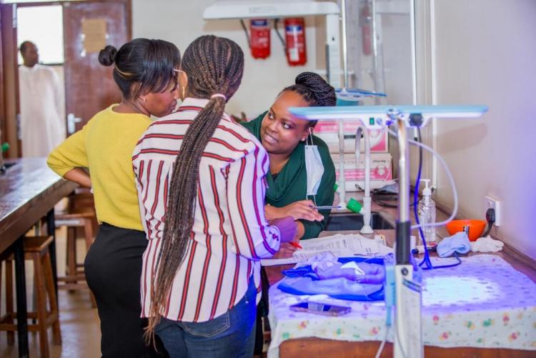 The Paediatrician trainees being taught how to use the NBU equipment in managing the newborn children.