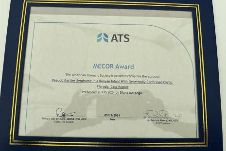 The MECOR award given to Dr. Diana Marangu for her case report